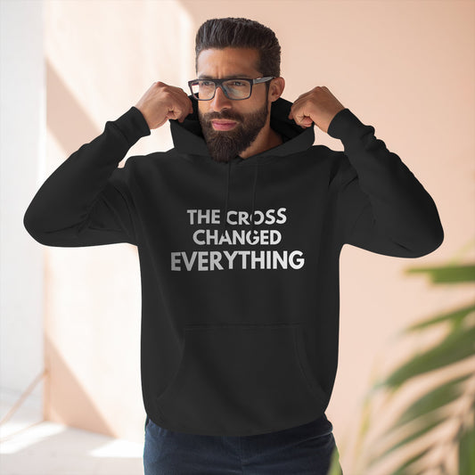 Black Christian hoodie with bold “The Cross Changed Everything” gospel message.